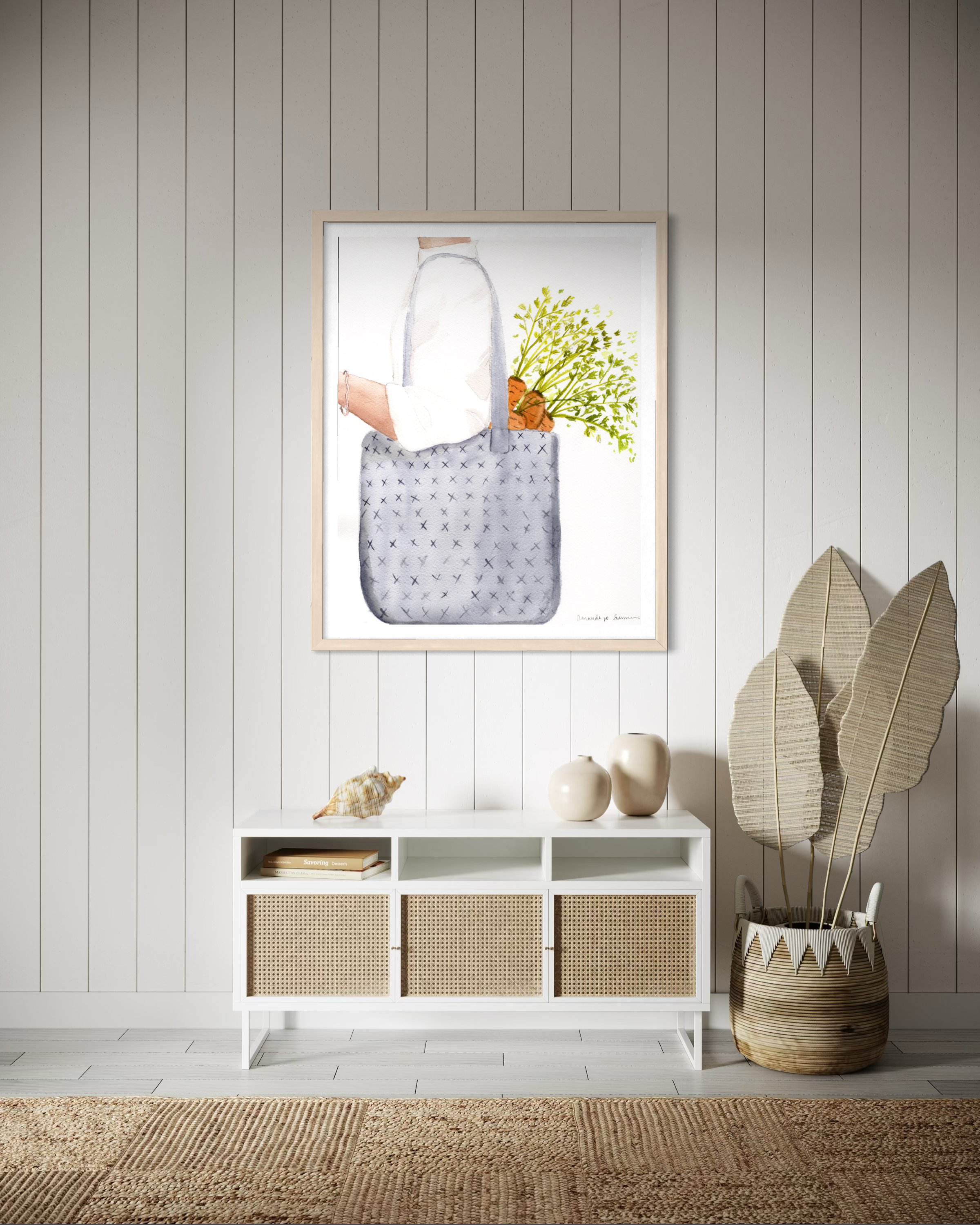 Hand-painted watercolor art of garden-fresh carrots in a market tote. Modern farmhouse kitchen decor in neutral tones with vibrant green accents, part of a seasonal Farmers Market collection.