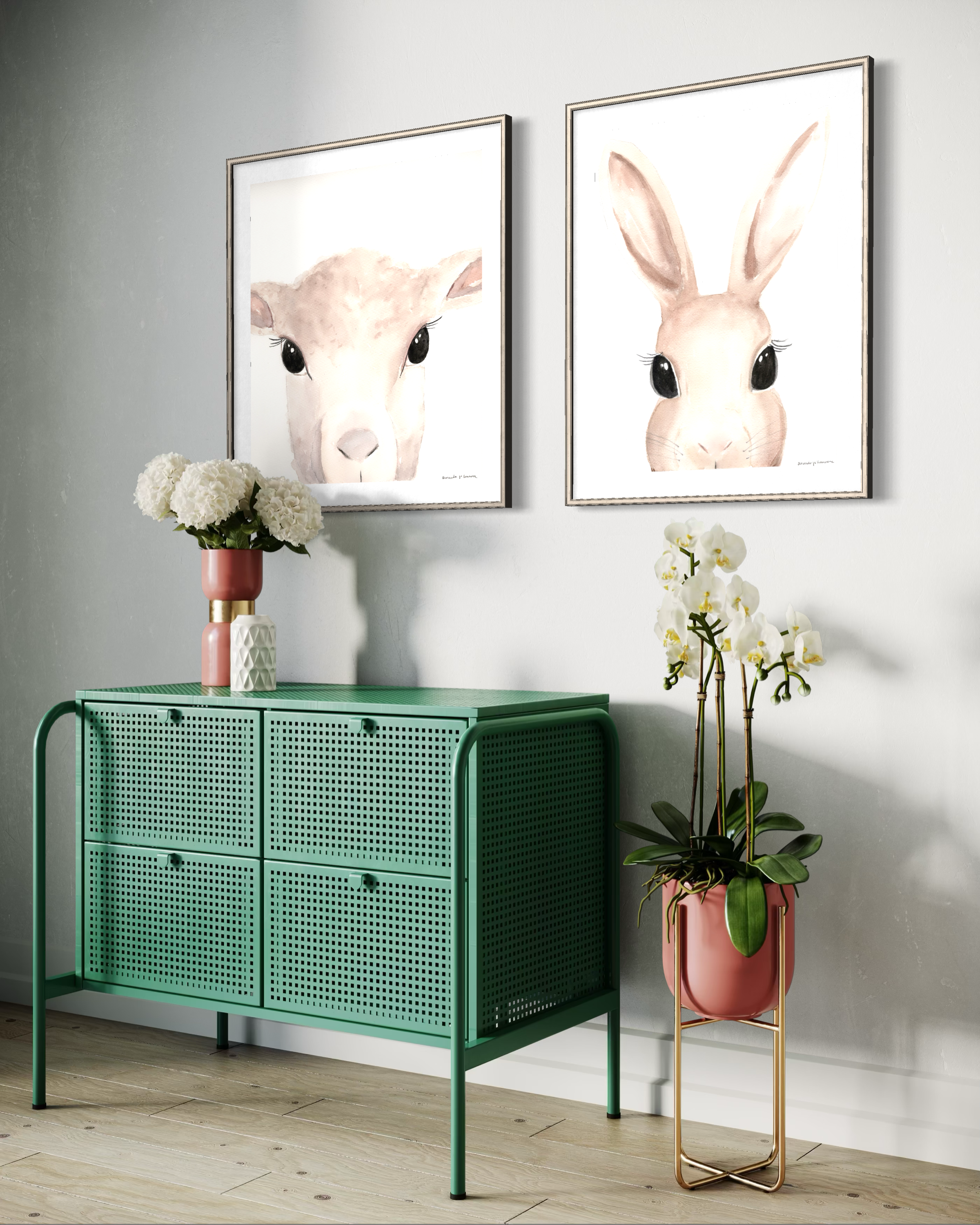 A sophisticated duo of minimalist watercolor animal portraits featuring a lamb and a bunny, staged together on a neutral wall. This pair of hand-painted Easter art prints creates a cohesive, modern spring gallery display.
